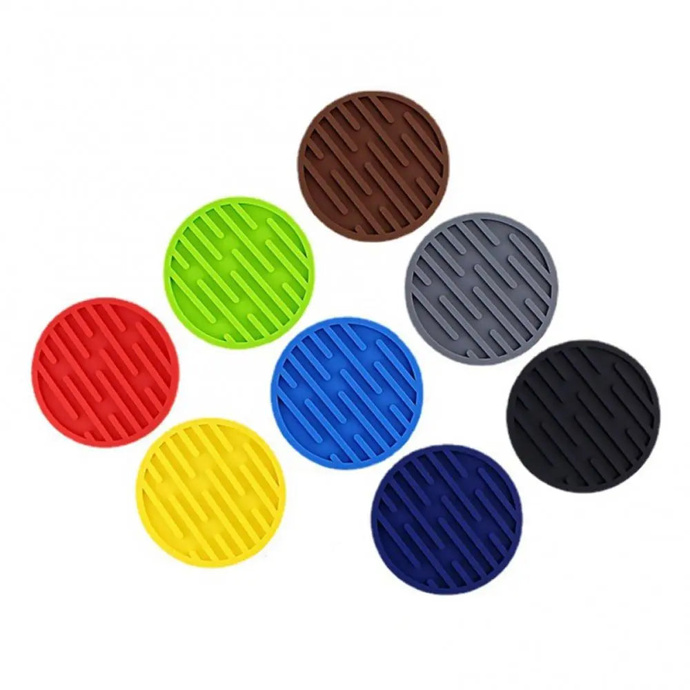 Round heat resistant silicone coasters for tea cups, coffee mugs, and glass beverages.