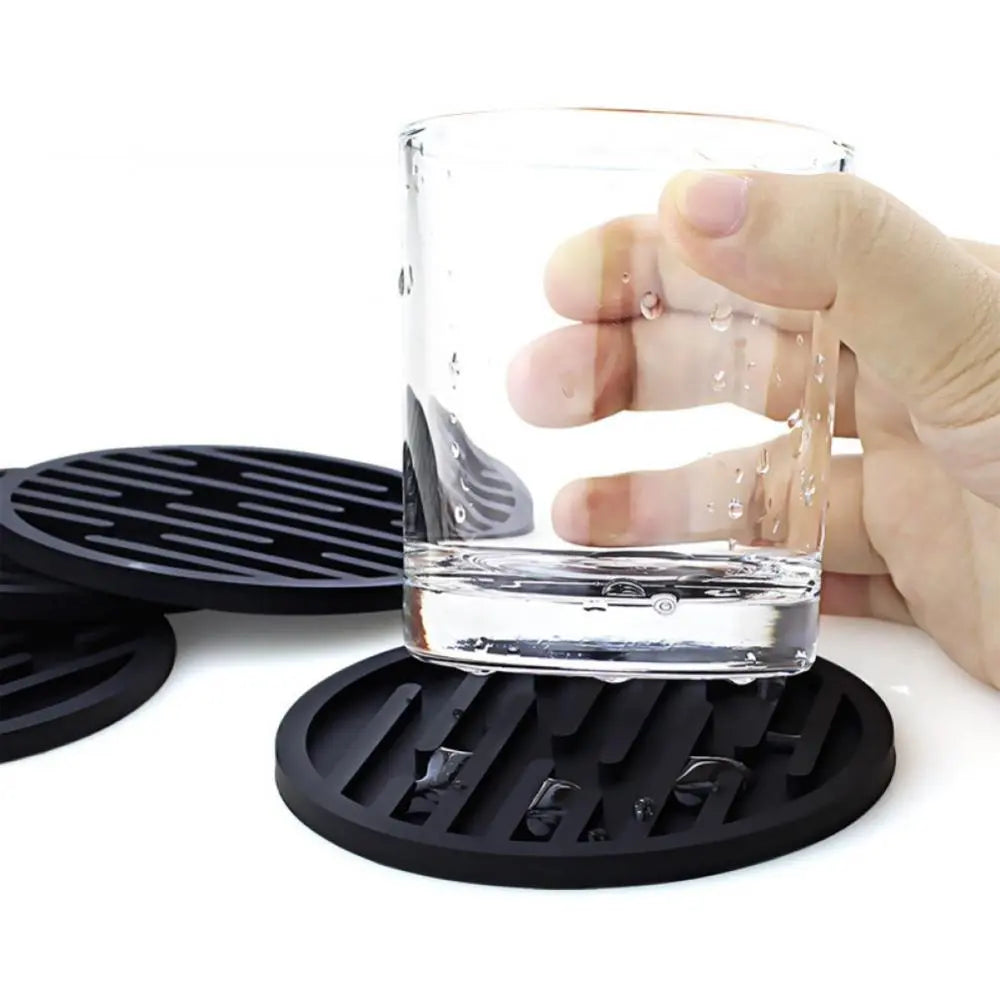 Round heat resistant silicone coasters for tea cups, coffee mugs, and glass beverages.