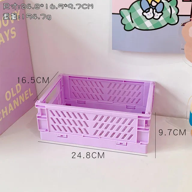 Foldable Plastic Storage Box: An organizer for students, this foldable storage box is perfect for desktop organization, storing stationery, snacks, and other items. It is a convenient accessory for home storage.