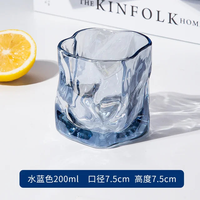 Thick glass beer cup with a twist design